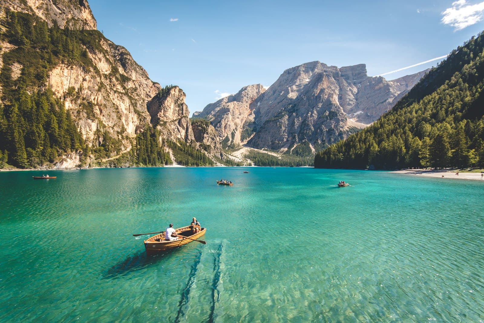Alpine lake reflecting surrounding mountains